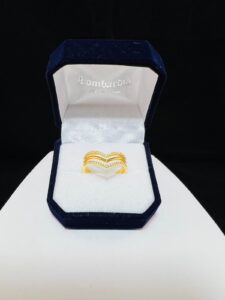 Anillo Valentino triple oro 9k.