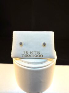 Abridor oro 18k Circonia.