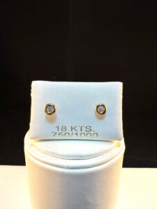 Abridor oro 18k Circonia.